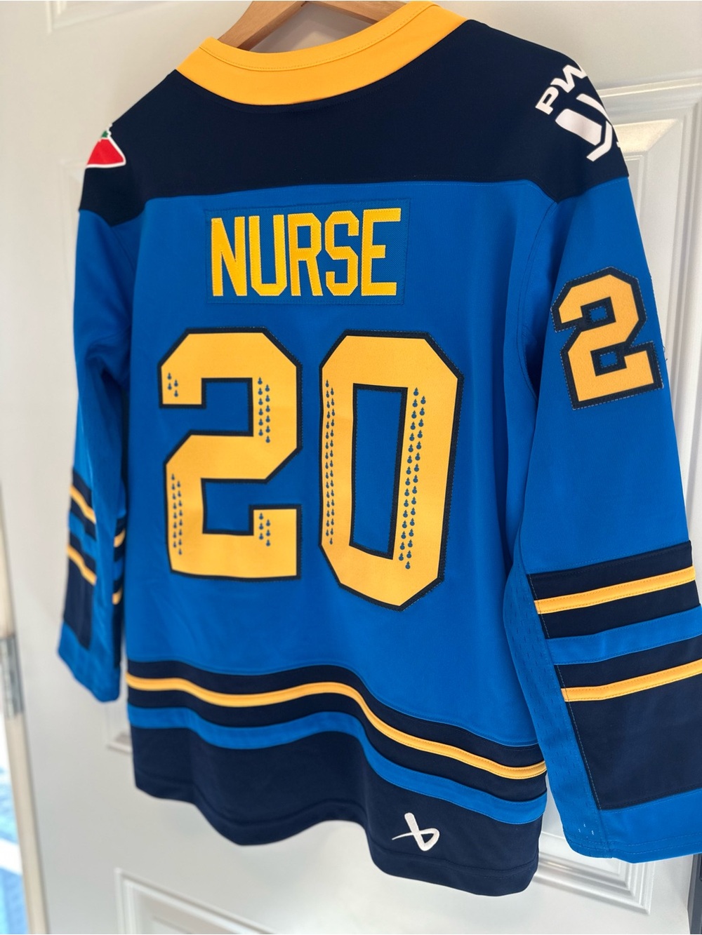 PWHL Toronto Sceptres Bauer youth L/XL jersey with “Nurse” on the back.